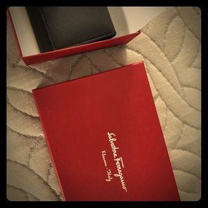 Brand new wallet w/price ticket and certificate.